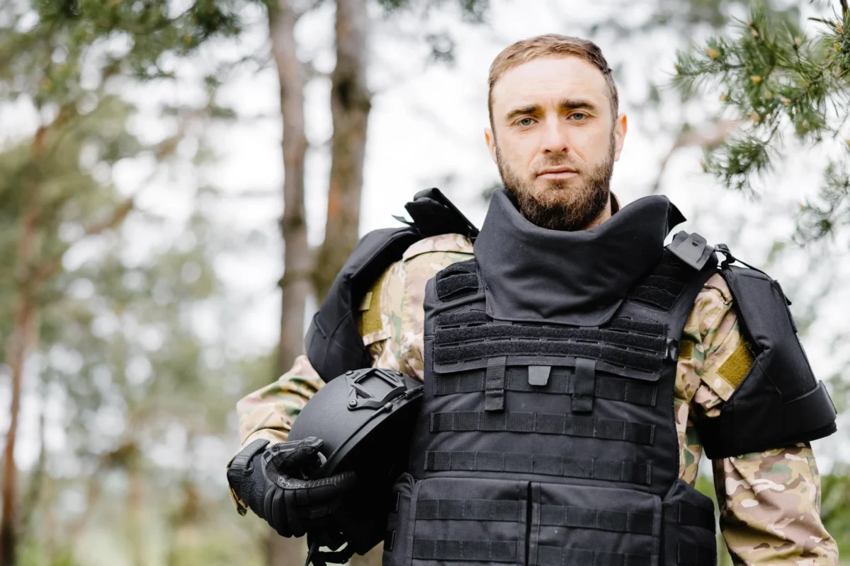 soldier-in-tactical-vest-works-in-the-forest-and-p-2026-03-18-17-42-38-utc-scaled.webp